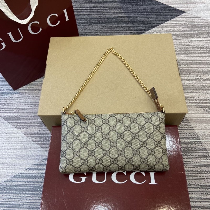 G*u*i top handle bags